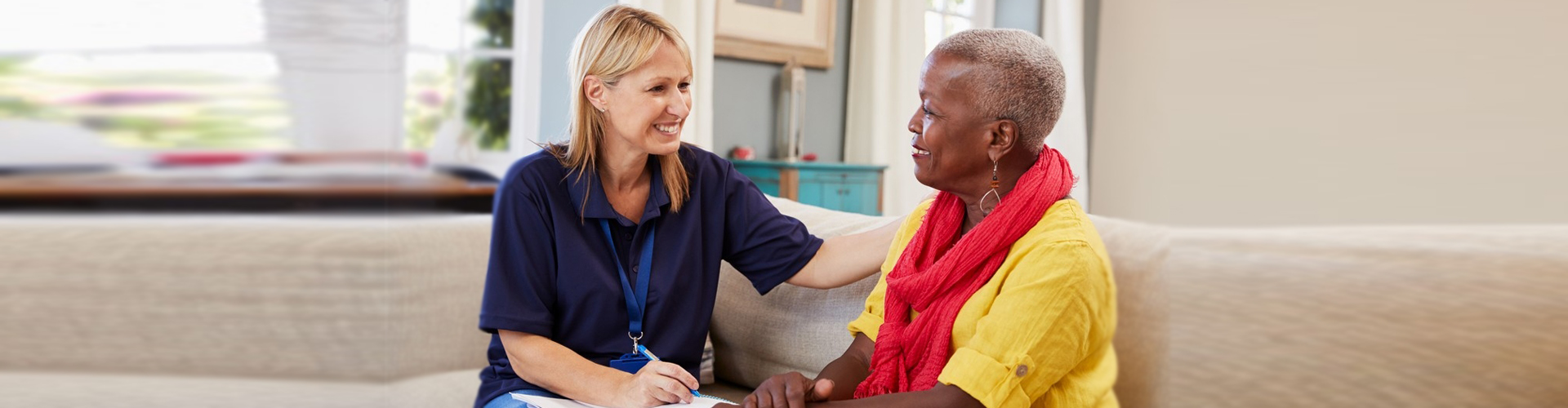 caregiver talking to elderly